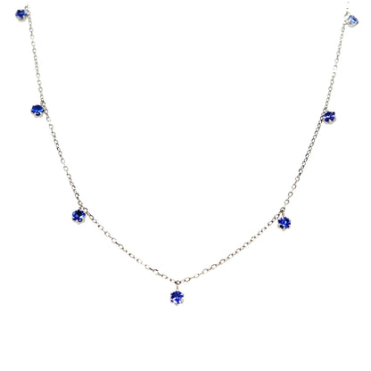 Tanzanite station necklace on a white background