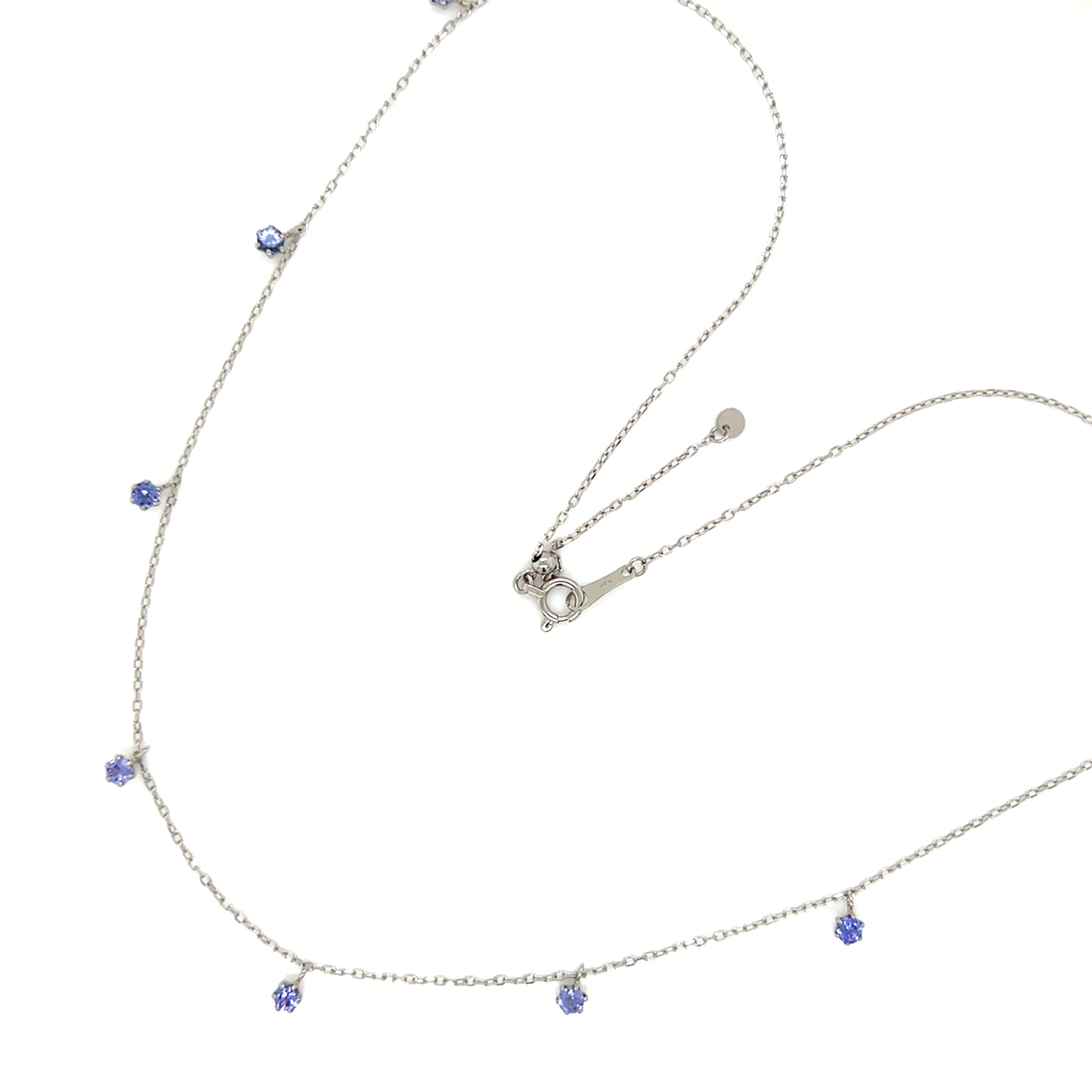 Platinum necklace with tanzanite on a white background