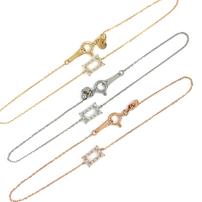 three gold chains with retangular designs on a white background