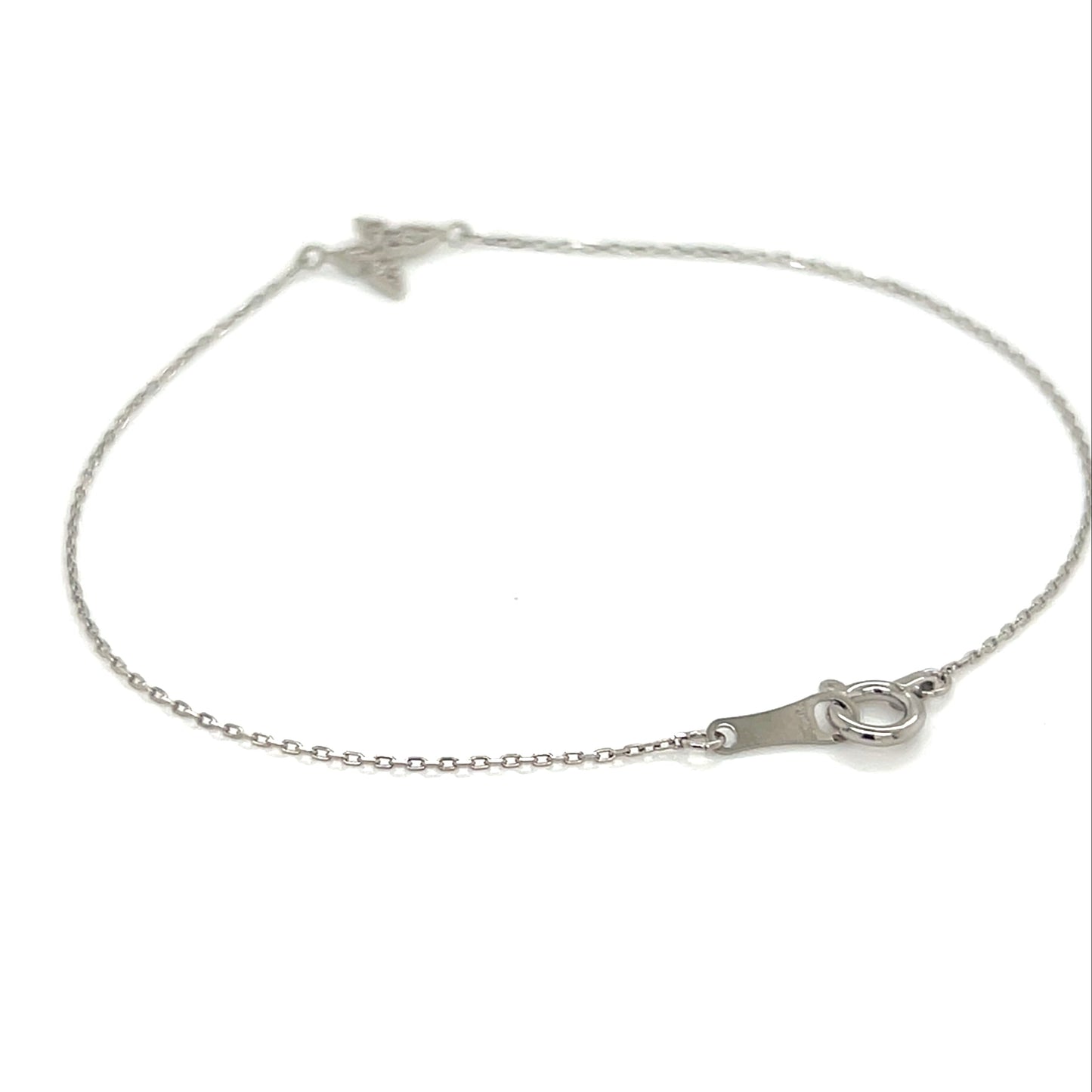 Platinum bracelet with butterfly on a white background