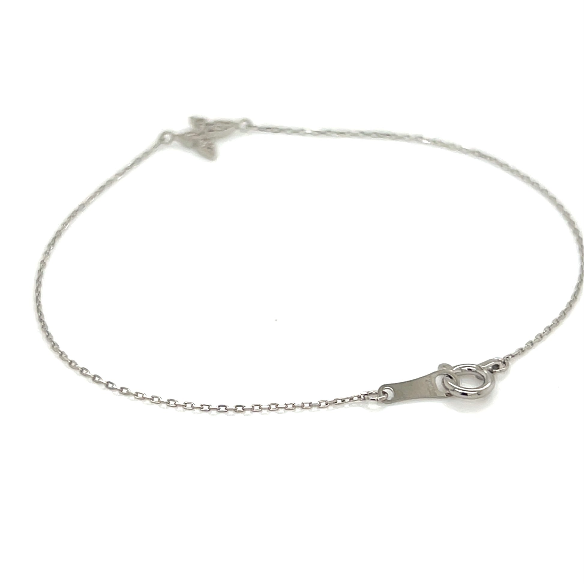 Platinum bracelet with butterfly on a white background