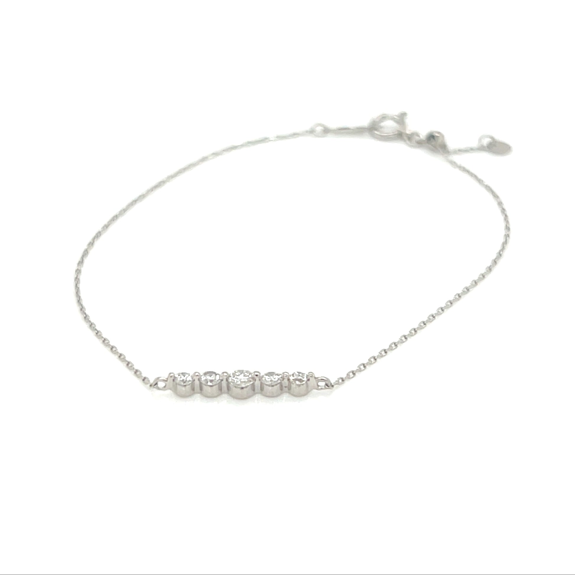 White gold bracelet with small bar on a white background