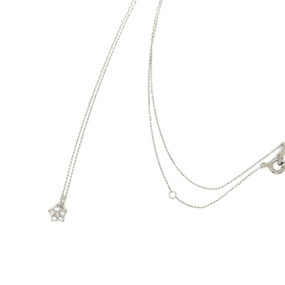 A delicate silver double-strand necklace featuring a small star-shaped pendant adorned with clear crystals, displayed against a solid white background.