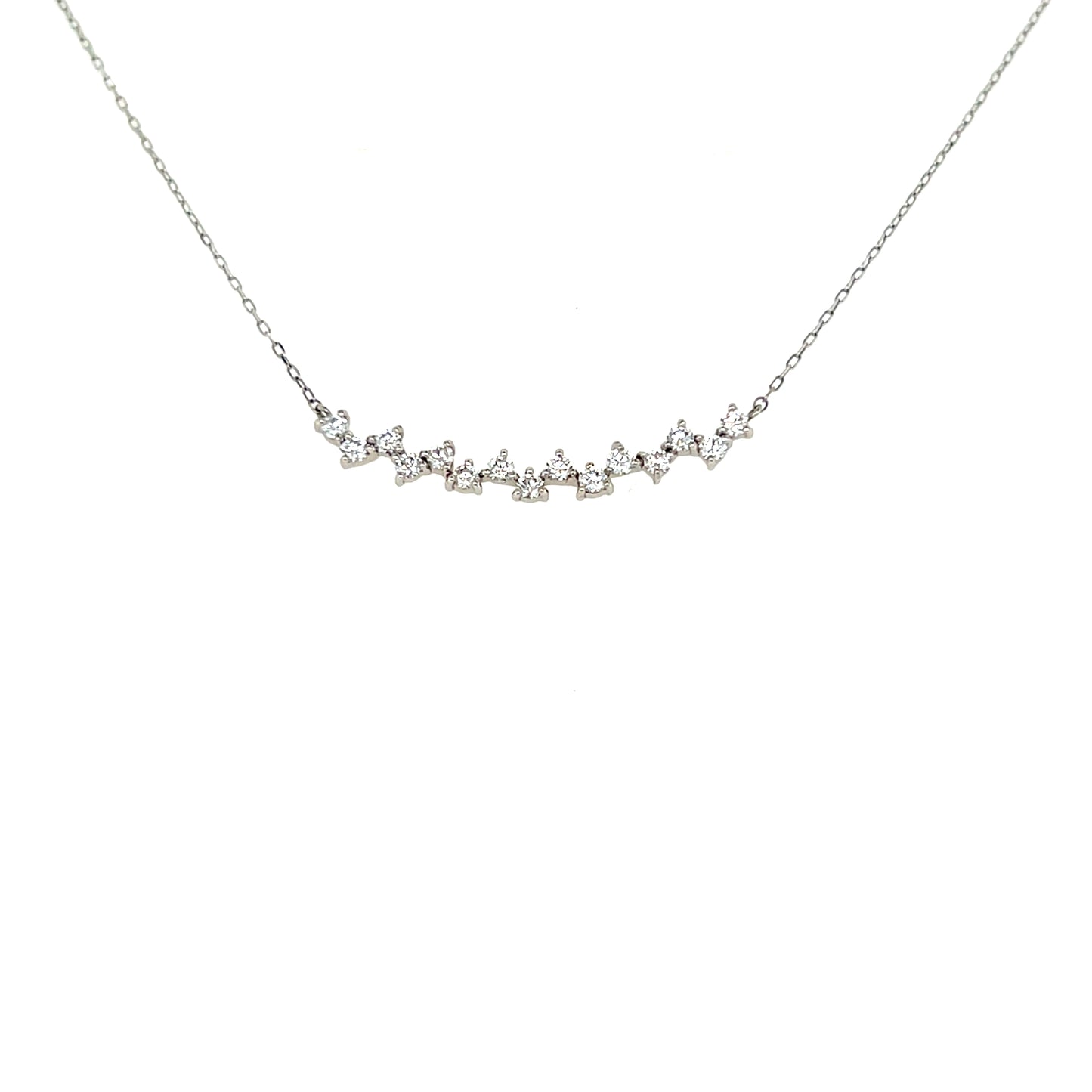 Delicate silver necklace with small diamonds on a white background