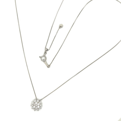 Platinum necklace with a snowflake pendant on a white background