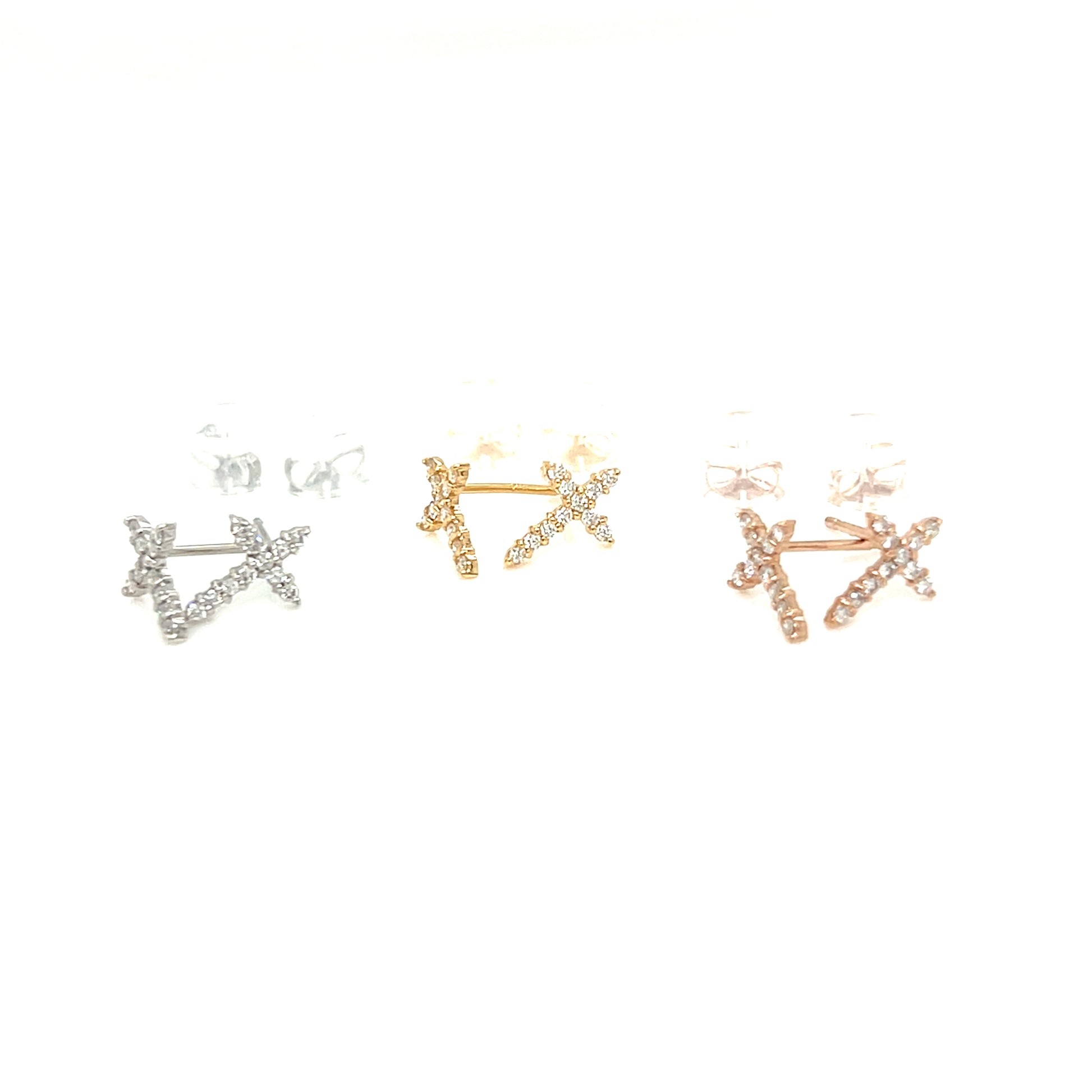 Three pairs of geometric stud earrings arranged horizontally on a plain white background. The left pair is silver-toned, the center pair is yellow gold-toned, and the right pair is rose gold-toned.