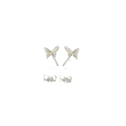 Butterfly-shaped silver earrings on a white background