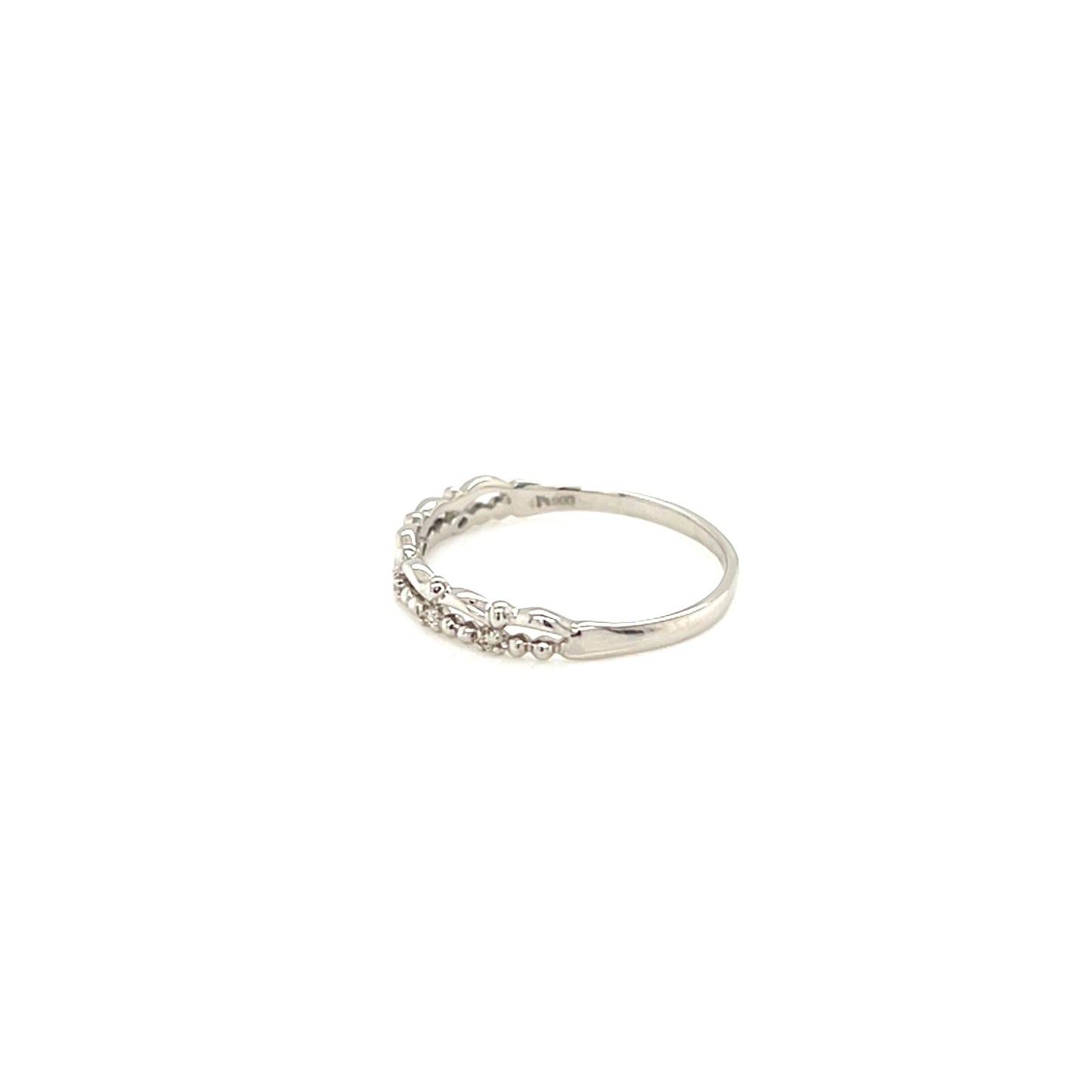Silver ring with small stones on a white background