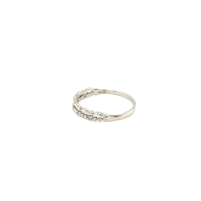Silver ring with small stones on a white background