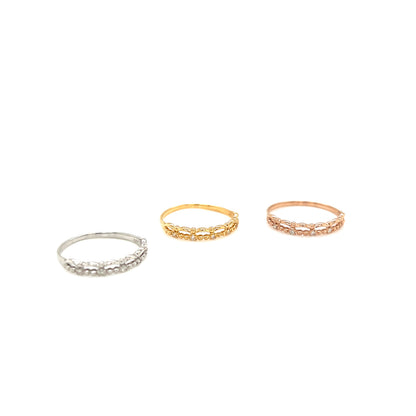 Three rings in silver, gold, and rose gold on a white background