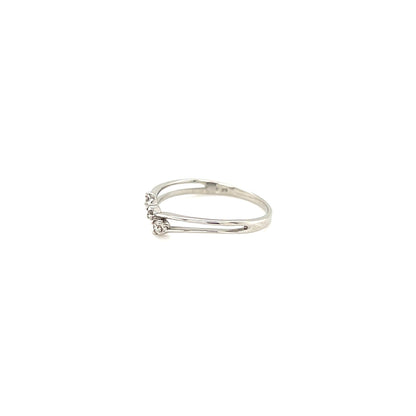 Silver ring with small stones on a white background
