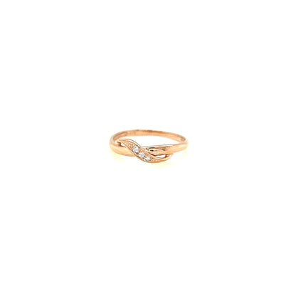 pink gold ring on a white background