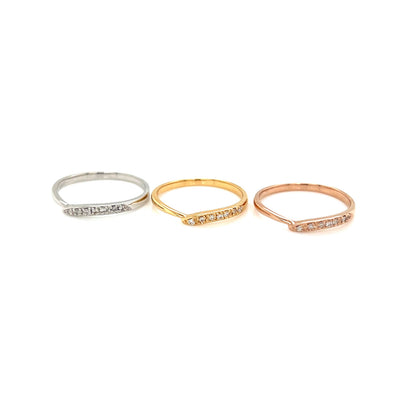 Three rings in silver, gold, and rose gold on a white background