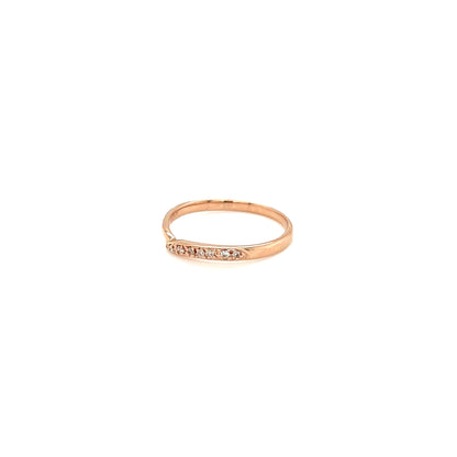 Gold ring with diamond on a white background