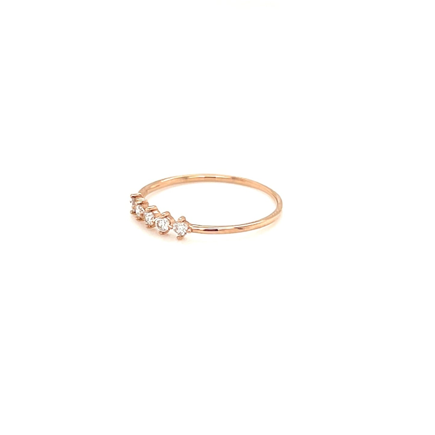 Rose gold ring with small diamonds on a white background