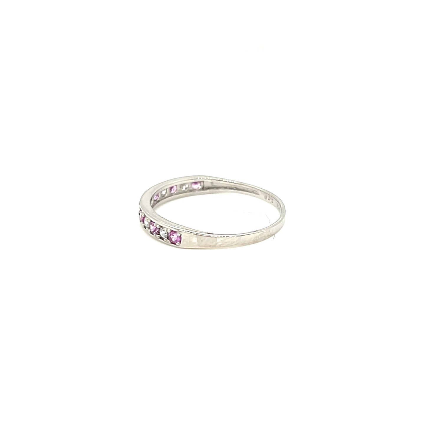 platinum ring with pink sapphire gemstones on a white background