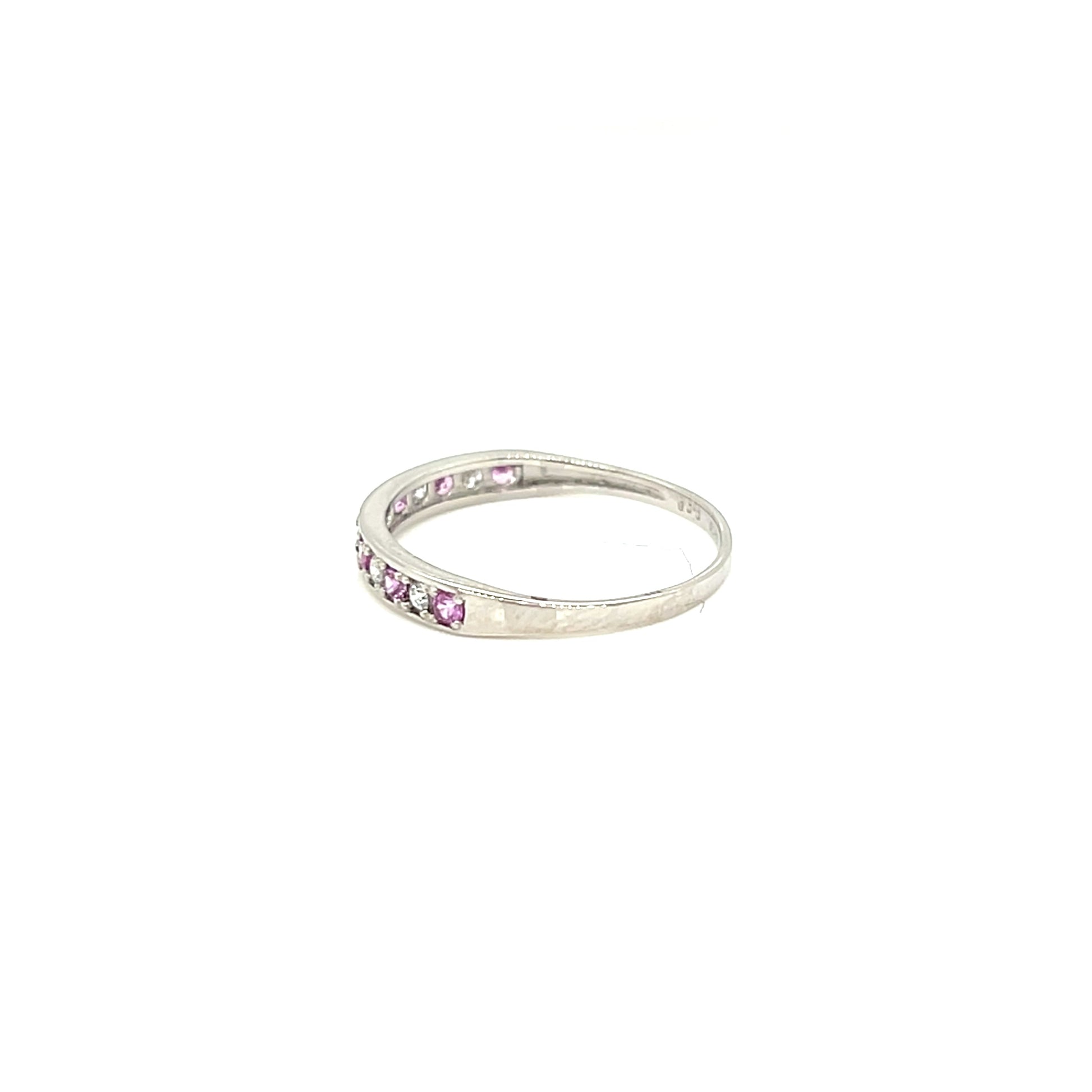platinum ring with pink sapphire gemstones on a white background