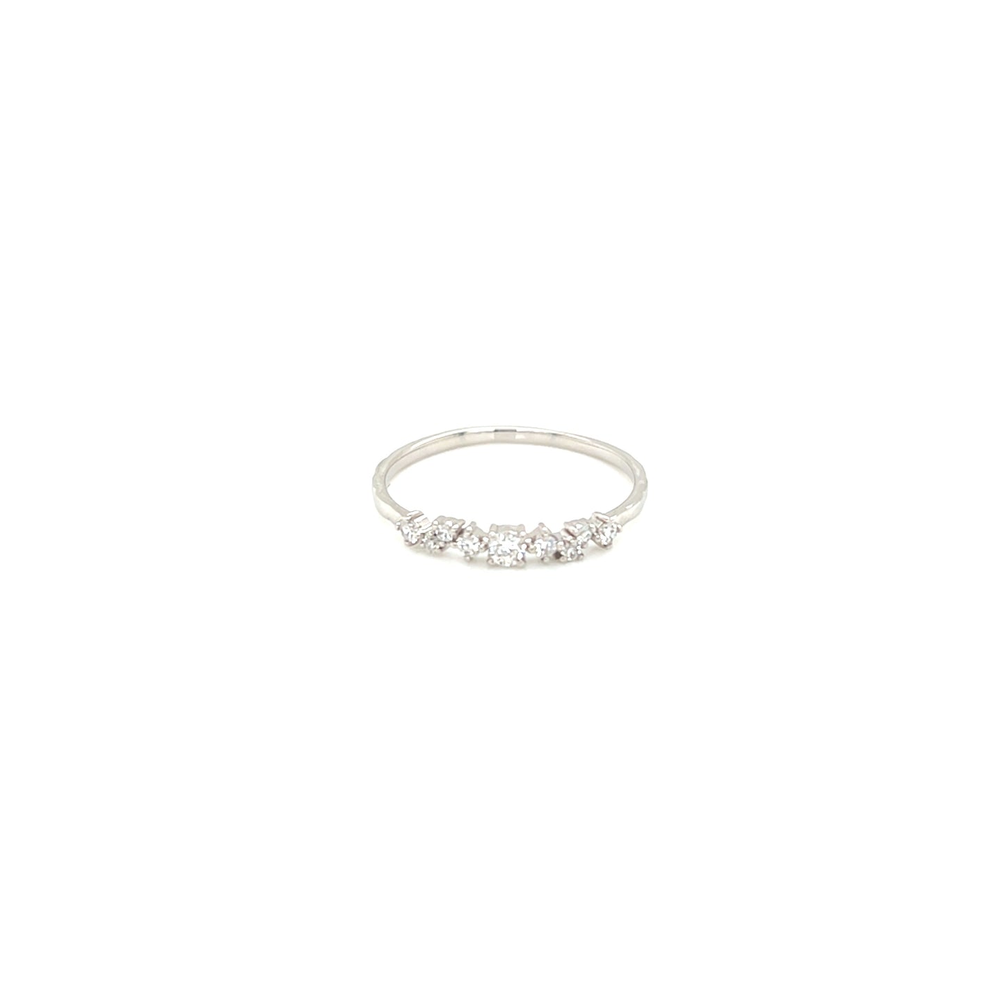 White ring with small diamonds on a white background