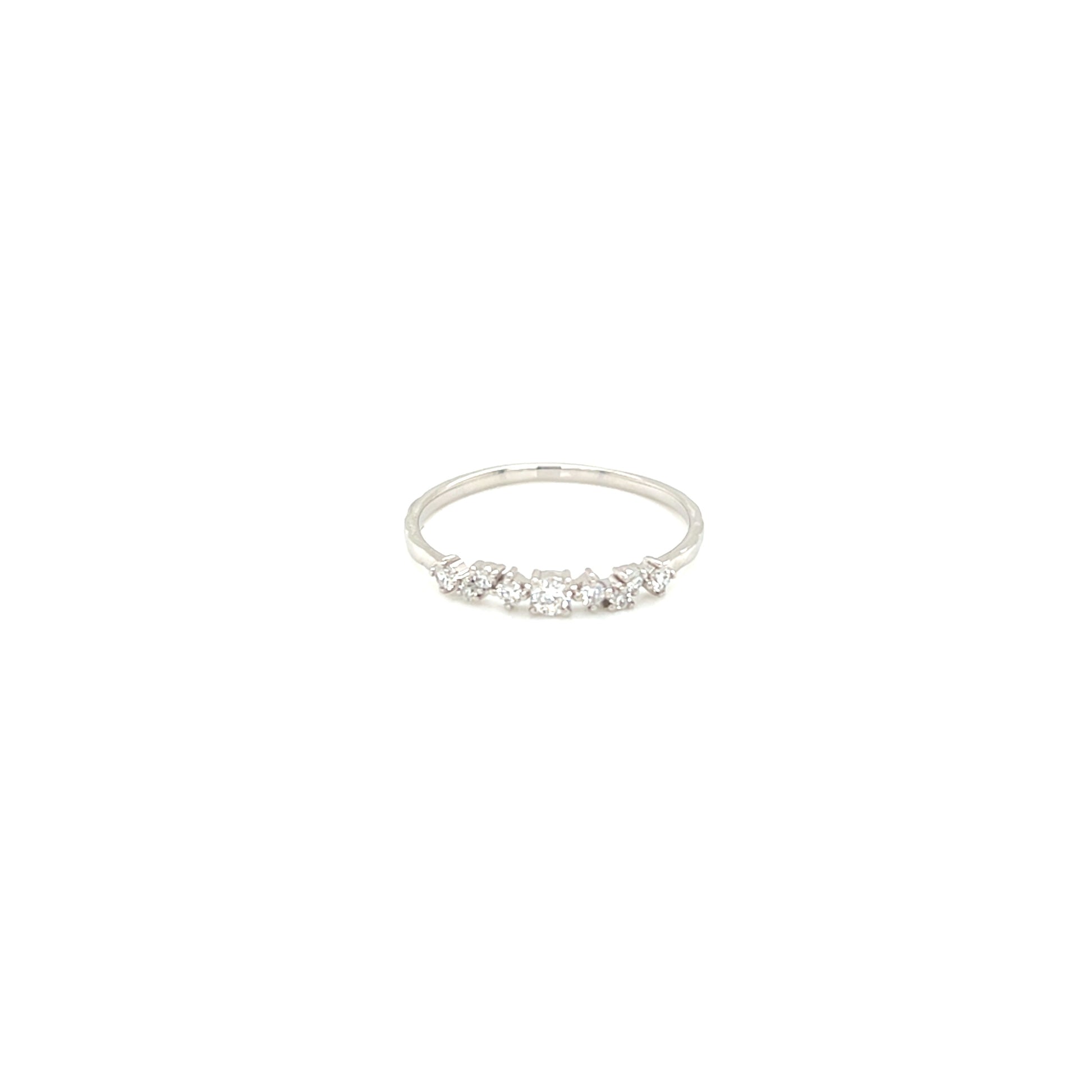 White ring with small diamonds on a white background
