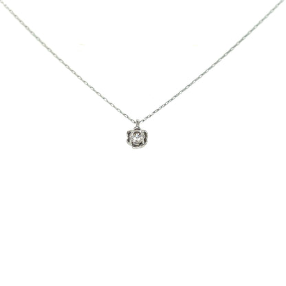White gold necklace with a small flower pendant on a white background