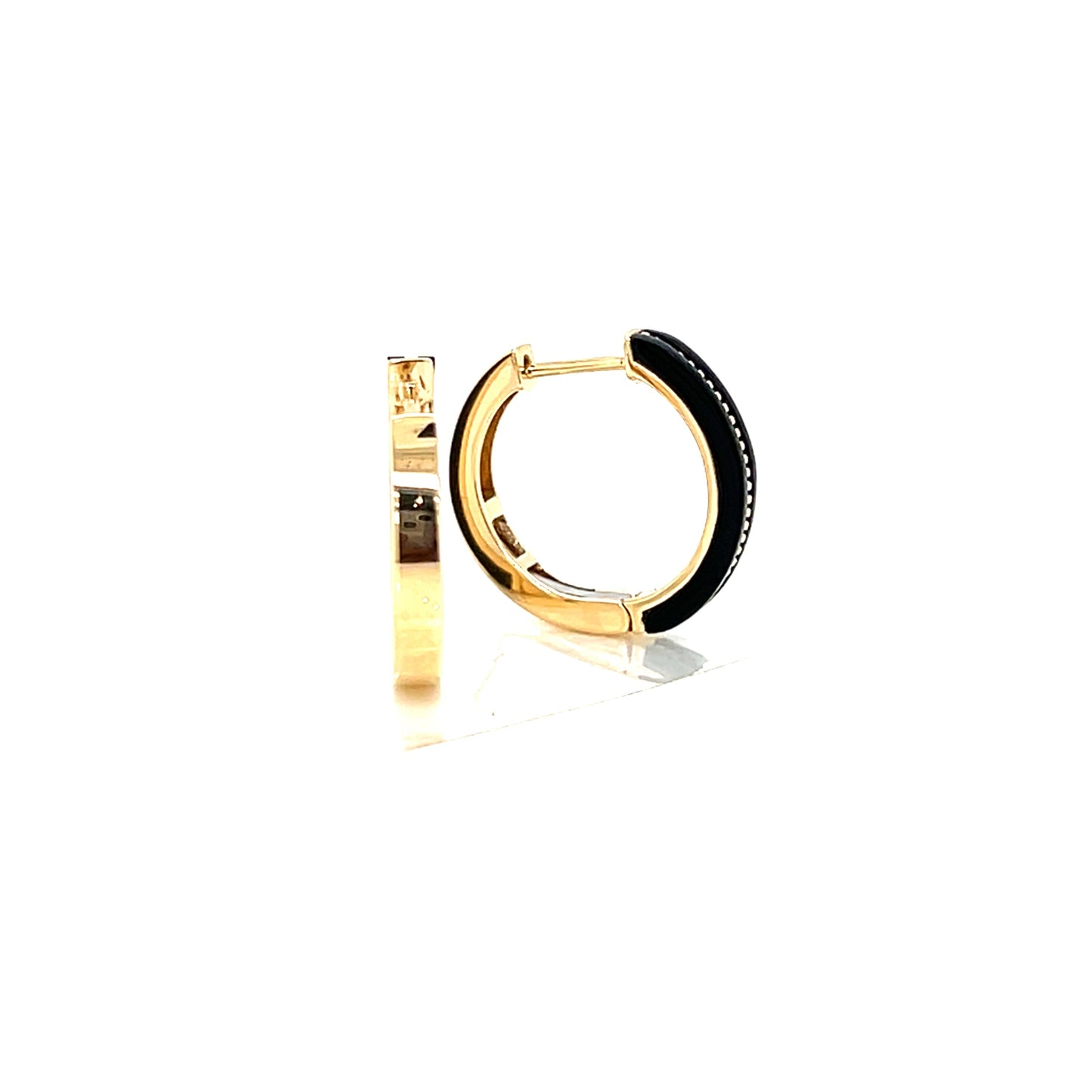 Gold hoop earrings with black oynx on a white background