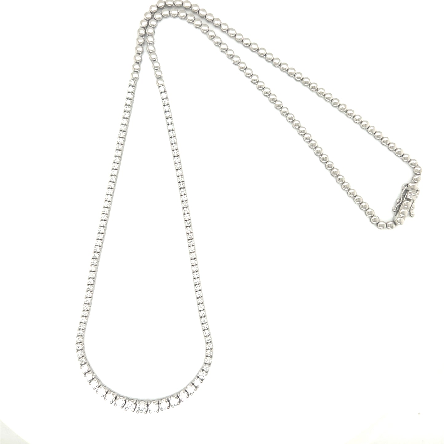 Platinum diamond Tennis necklace on a white background