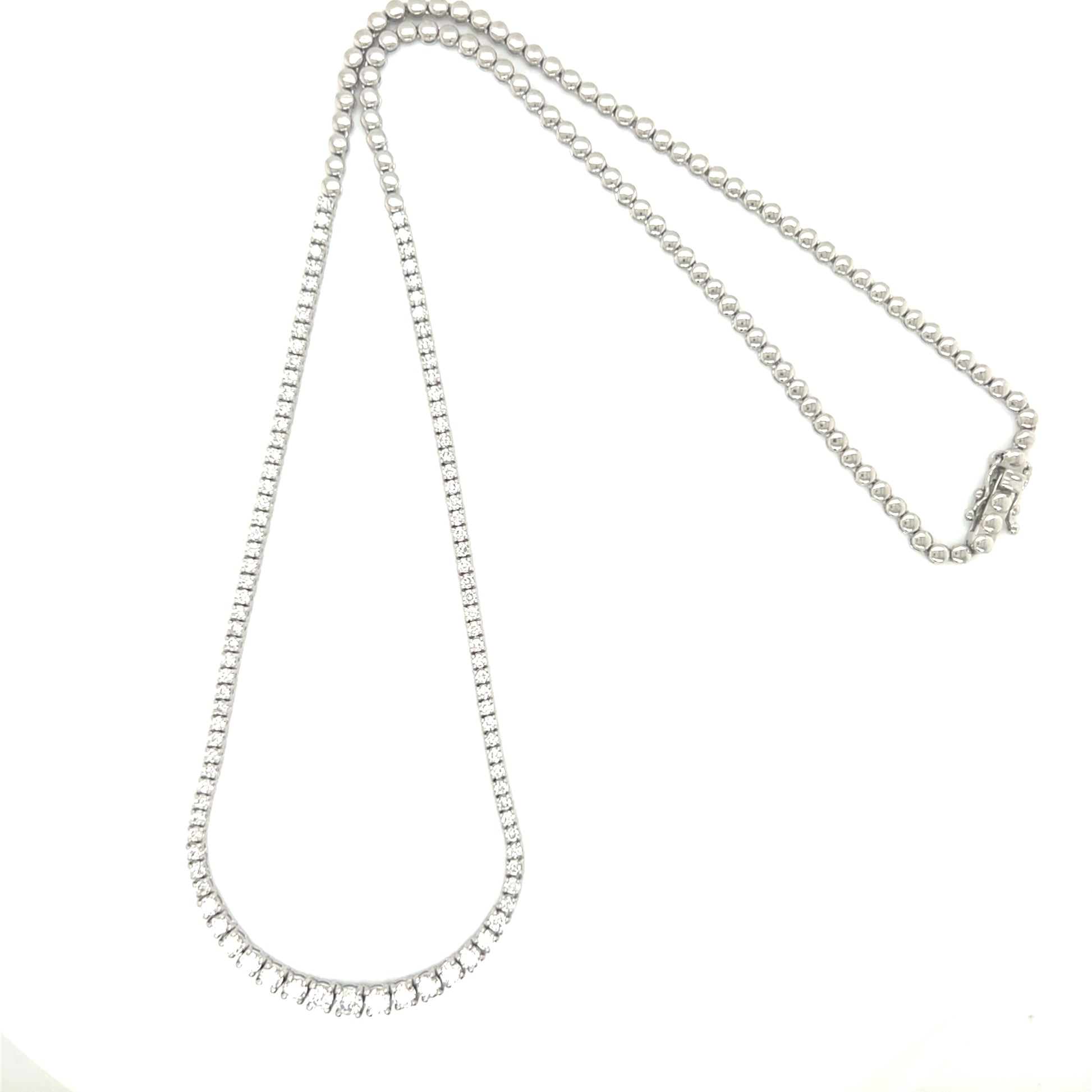Platinum diamond Tennis necklace on a white background