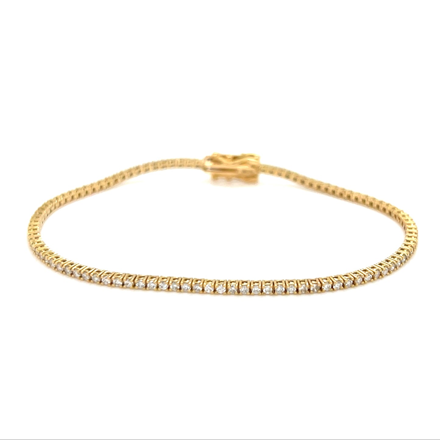 Gold bracelet with small diamonds on a white background