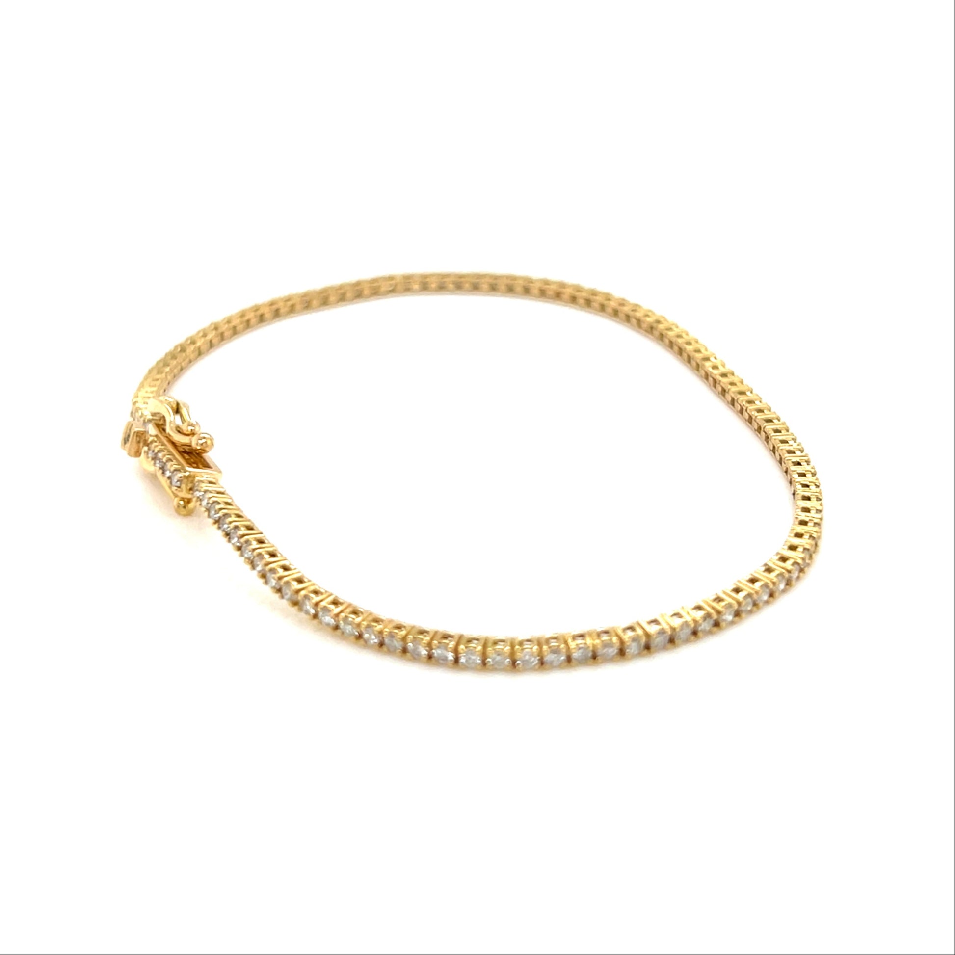 Gold bracelet with small diamonds on a white background