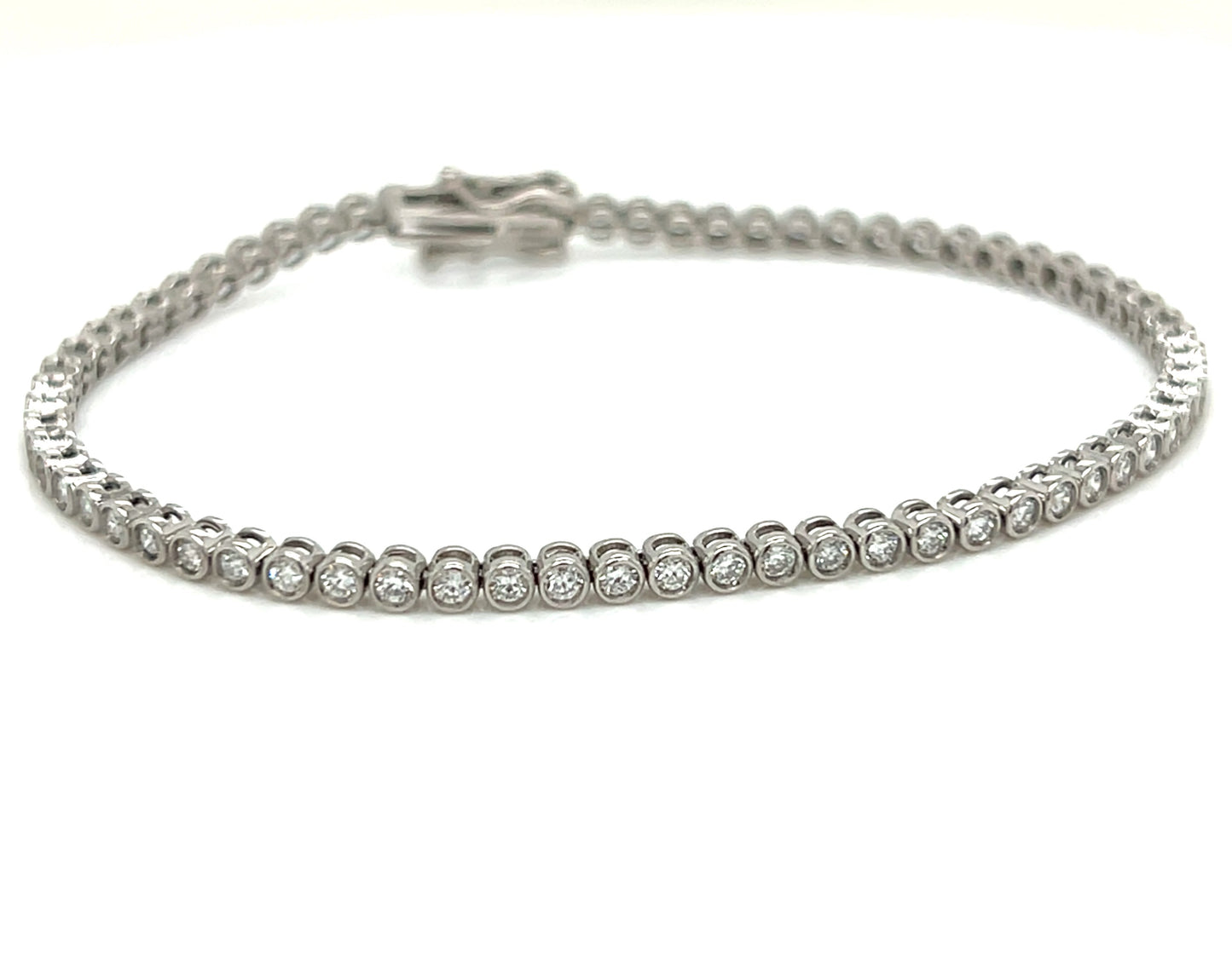 Bezel setting diamond tennis bracelet on a white background