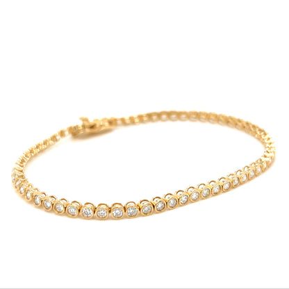 Tennis bracelet with small diamonds on a white background