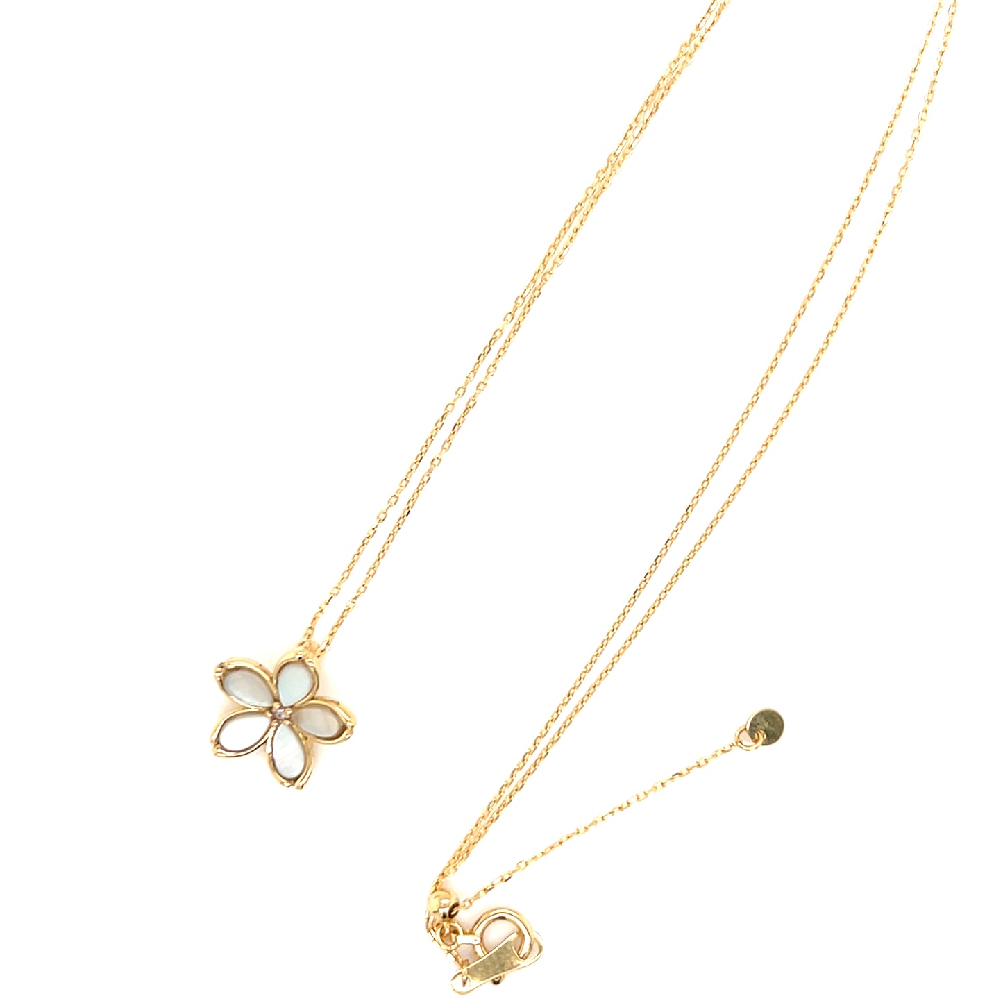 Gold necklace with a butterfly pendant on a white background