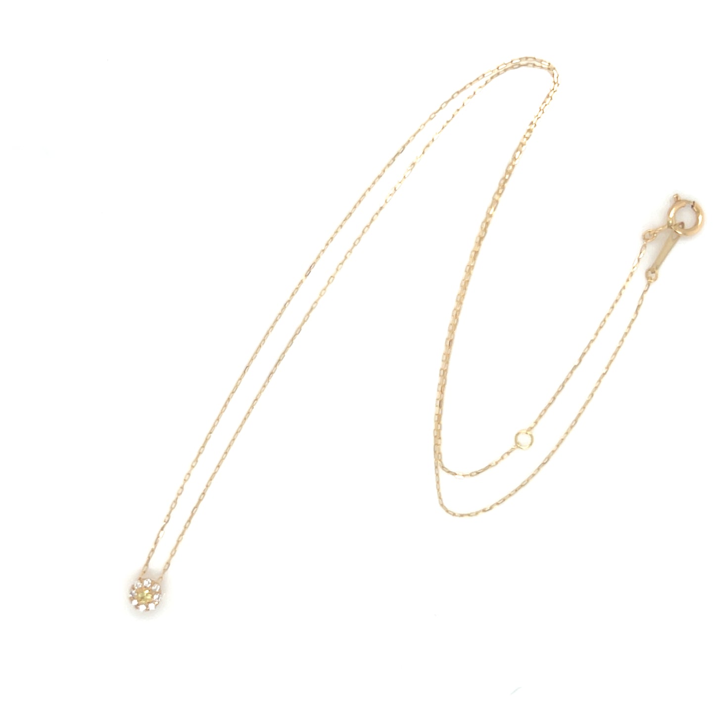 Yellow Sapphire Gold necklace with a clasp on a white background