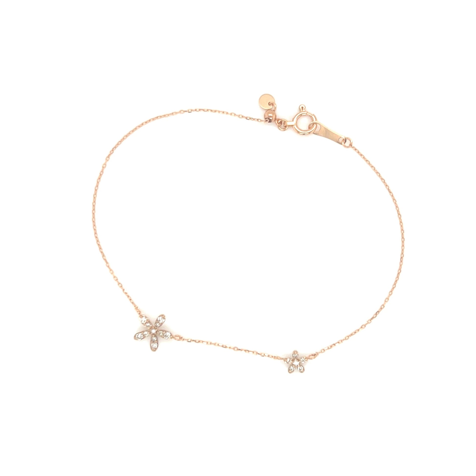 Rose gold bracelet with star-shaped charms on a white background